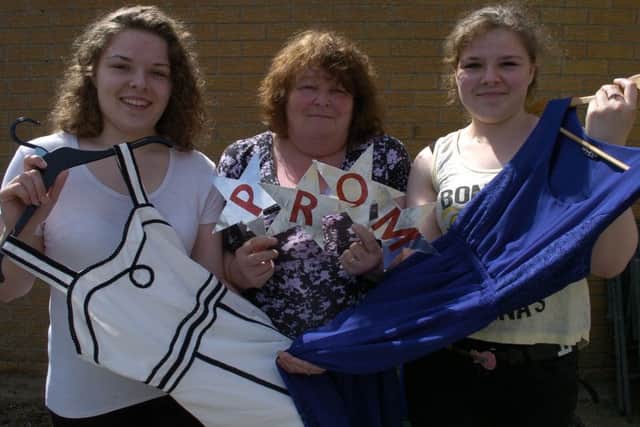 Aliscia and Mia Jackson with their mum Irene making preparations for the prom. ANL-160530-073105001