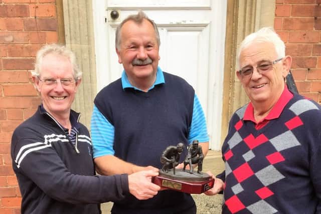 Ron King Trophy winners Steve Blackburn (left) and Grahame Hewstone(right) with Seniors' Captain Roger Culpin EMN-160523-093525002