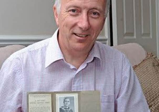 Rob Belton with a picture of his great uncle who was killed at the Battle of Jutland 100 years ago EMN-160523-154202001