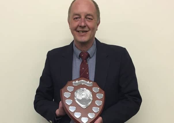 Richard Walker with the Sally Walker Shield for Player Personality. ANL-160524-130427001