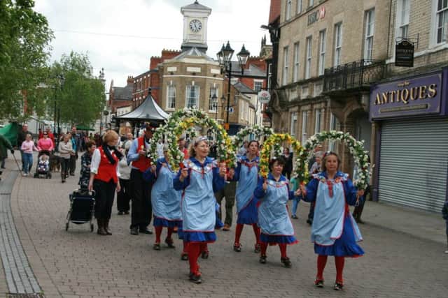 The Pump Blessing Parade passes through the Brigg market place EMN-160526-074609001