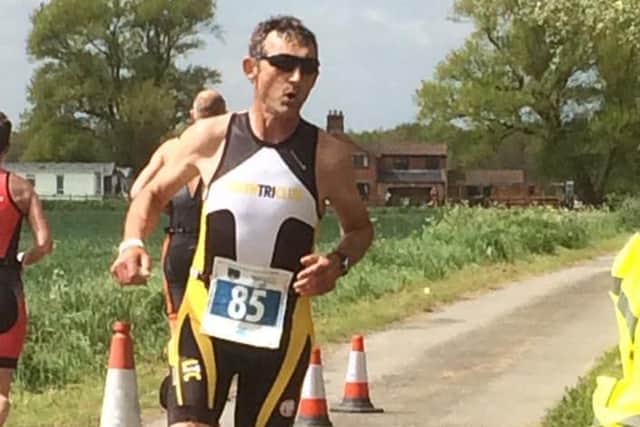 Louth Tri Club chairman Steve Hunt approaches the finish in Skegness Picture: Steve Bailey EMN-160530-103429002