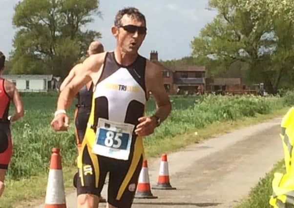 Louth Tri Club chairman Steve Hunt approaches the finish in Skegness Picture: Steve Bailey EMN-160530-103429002