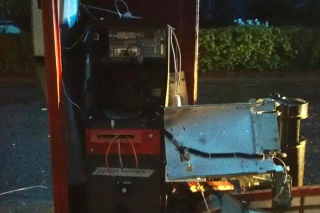 The damaged cash machine.