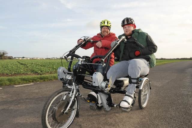 Ryan Smith and his dad Mark.