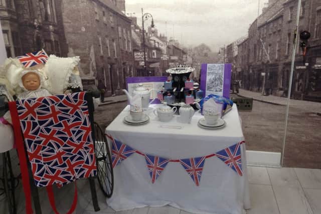 A tea party scene set up in Sleaford Museum. EMN-160606-122334001