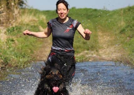 Canicross Horncastle member Tracy Evans and dog Oscar.