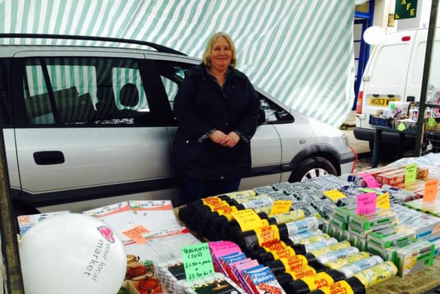 Amanda Carter on her new household essentials stall. EMN-160528-121656001