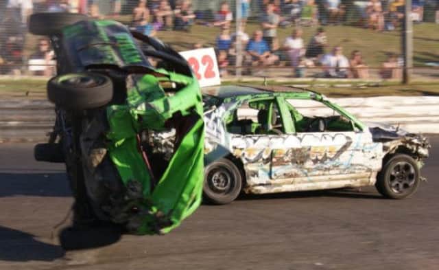 Banger action at Skegness Stadium. ANL-160531-150932001