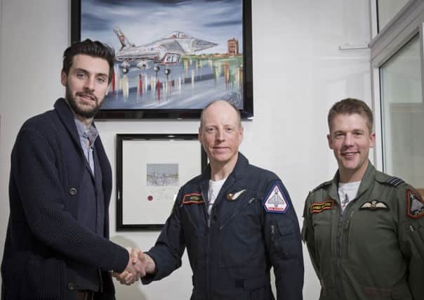 Artist Mr Edward Waite has presented one of his paintings to RAF Coningsby which will be raffled and the proceeds going to RAF charities. EMN-160531-161441001
