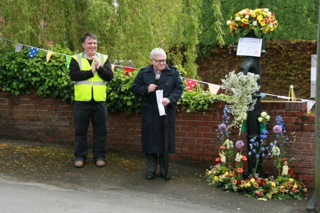 The Rev Ian Wales blessing the newly decorated pump at the Nelthorpe Arms, with Malcolm Bailey,Chairman of Brigg Business Partnership. EMN-160106-123149001