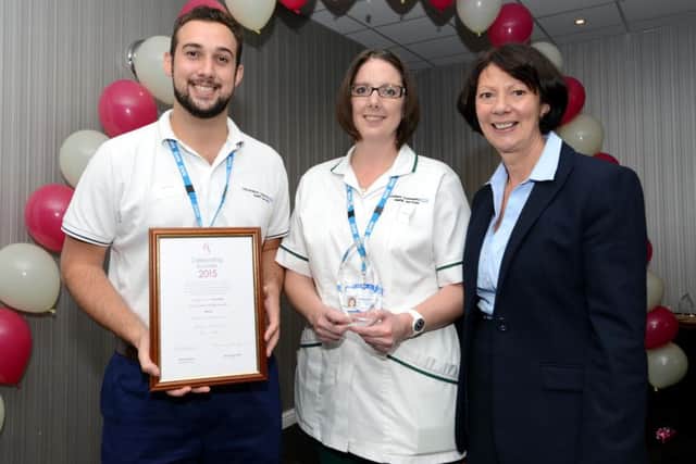 Last years Chairs Award winners. Ryan Newton and Rebecca Brookes with chair Elaine Baylis.