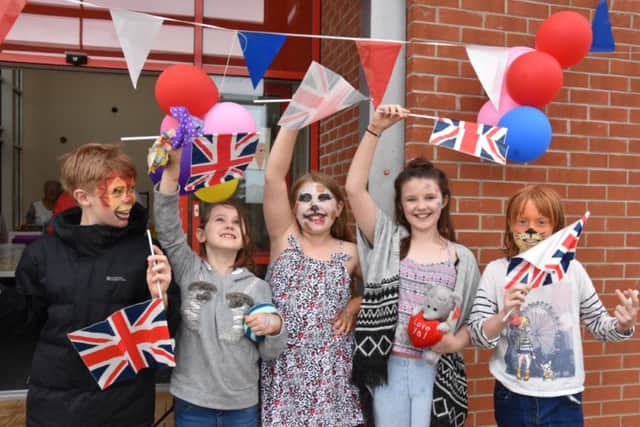 Local children who enjoyed the Royal Celebration at Wragby Community Hub on Sunday afternoon to honour the Queen`s 90th Birthday.
Photo John Edwards. EMN-160613-065701001