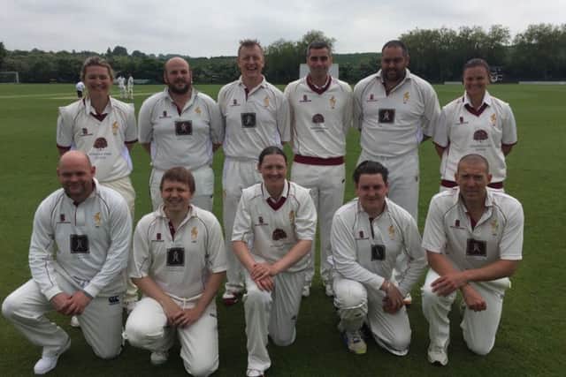 Charlotte Edwards (back row, left) and New Zealand skipper Suzie Bates (back, right) join Louth Second XI for their match with Haxey. Also pictured, from left, back - Richard Limmer, Jason Fisher, Dan Rankin, Reggie Koen; front - Steve Wright, John Medler, Arran Brindle, Henry Tye, Stewart West EMN-160606-100449002