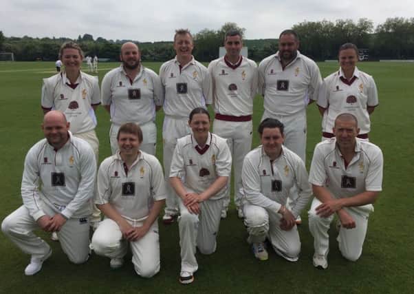 Charlotte Edwards (back row, left) and New Zealand skipper Suzie Bates (back, right) join Louth Second XI for their match with Haxey. Also pictured, from left, back -  Richard Limmer, Jason Fisher, Dan Rankin, Reggie Koen; front - Steve Wright, John Medler, Arran Brindle, Henry Tye, Stewart West EMN-160606-100449002