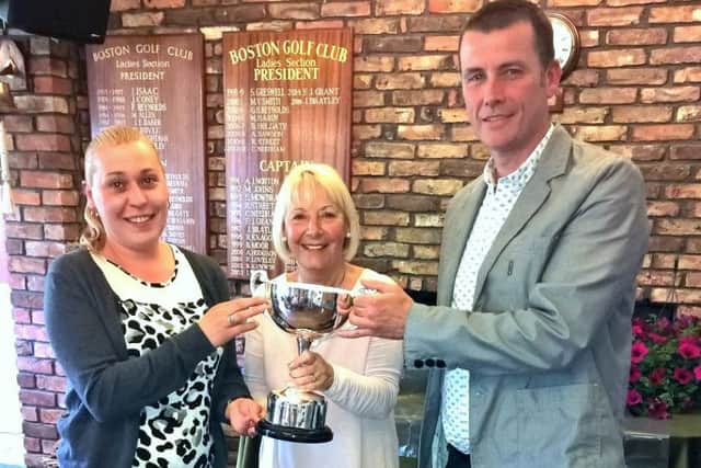 Neil Gott and Rexine Burton receive the Jean Howes Trophy from Boston lady captain Anne Wallhead EMN-160606-134805002