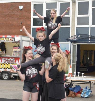 Run to Remember event at Wainfleet's Magdalen School. Wainfleet Mighty Warriors entertaining the visitors.