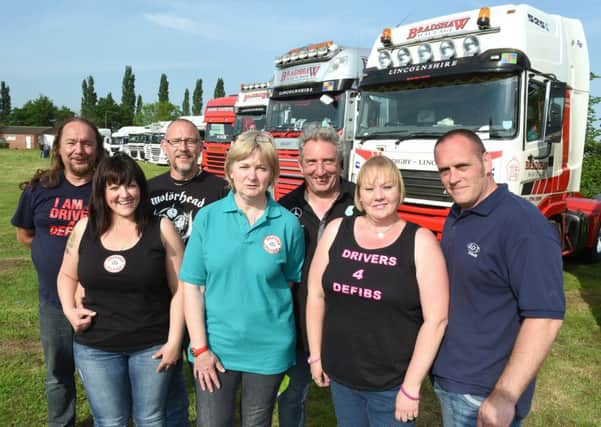Drivers 4 Defibs fun day at Billinghay. Organisers L-R ennis Darmon, Rebecca Bradshaw, Fred Bradshaw, Sally Donner, Neil Donner, Louise Couling, Dan Couling. EMN-160606-170317001