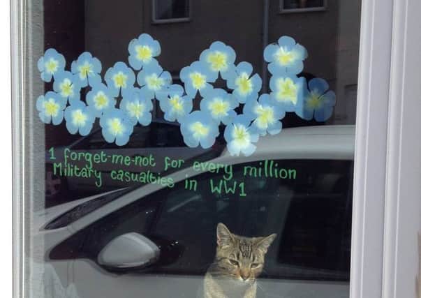 Ashley Hanlon's test Forget-me-Not window for the Sleaford Remembrance Trail 2016 project. EMN-160706-110215001