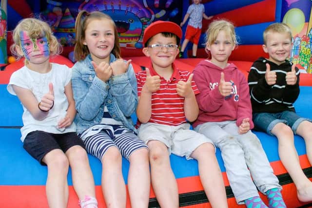 Children enjoying the Picnic in the Park in Tower Gardens, Skegness. Pictured (left to right) are Jessica Ramsden, 4, Alycia Dickinson, 8, Rio Dickinson, 7, Grace Ramsden, 6, and Adam Freeston, 7, all  of Skegness. ANL-160613-122827001