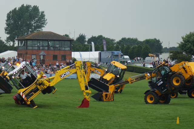Digger dancing at the Lincolnshire Show EMN-160625-120958001
