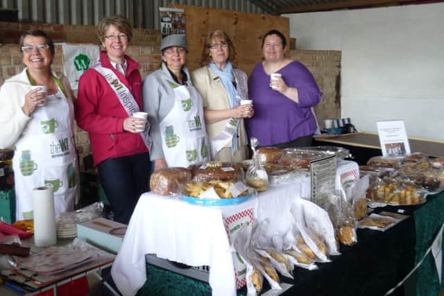 Binbrook WI members on their stall at Stainton le Vale EMN-160629-212623001
