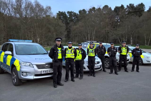 Some of the officers from Operation Aardwold gather at Willingham Woods EMN-160107-155300001