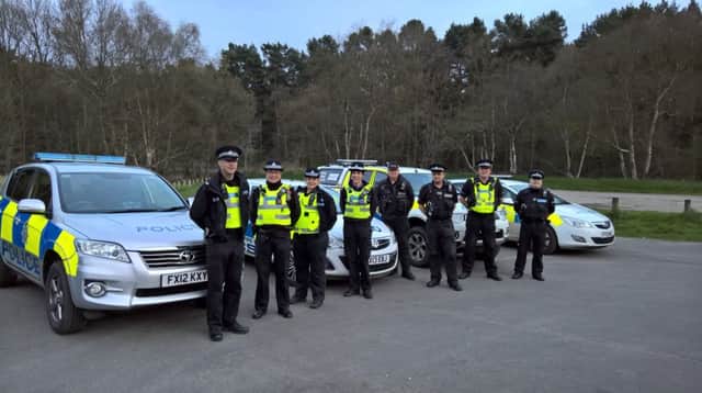Some of the officers from Operation Aardwold gather at Willingham Woods EMN-160107-155300001