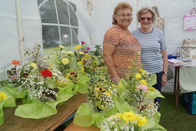 Rosie Dawson and Joan Zealand on the Rase WI stall at last year's gala EMN-160906-232401001