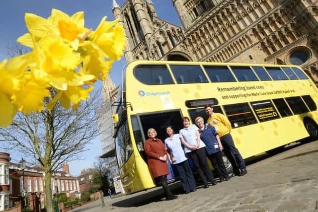 Stagecoach East Midlands Daffodil Bus launch. From left, MIchelle Hargreaves (MD of Stagecoach East Midlands), Marie Curie nurses Allsion Foster and Carol Carter, Sue Smith (technial nurse manager for Marie Curie) and Gary Burr (community fundraiser for Marie Curie).