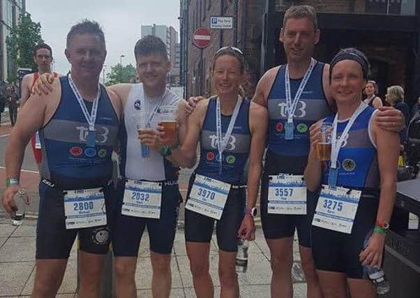 Some of the Sleaford triathletes enjoy a well earned post-race drink at Leeds. FVcVRaqjm1nN0zPlJy1n