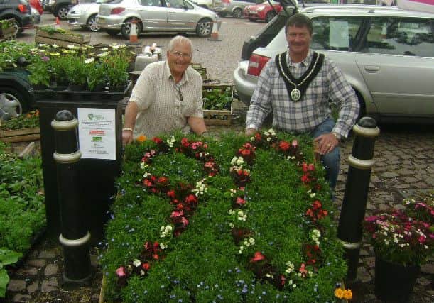 The specially commissioned town floral display at Market Rasen EMN-160613-080034001