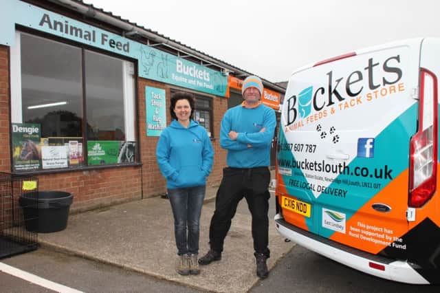 Owners Bob and Alex with their newly-branded company van.