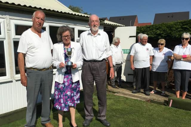Susan Thornton presents the winners trophy to Bill OReilly and John Ward EMN-160620-085605002