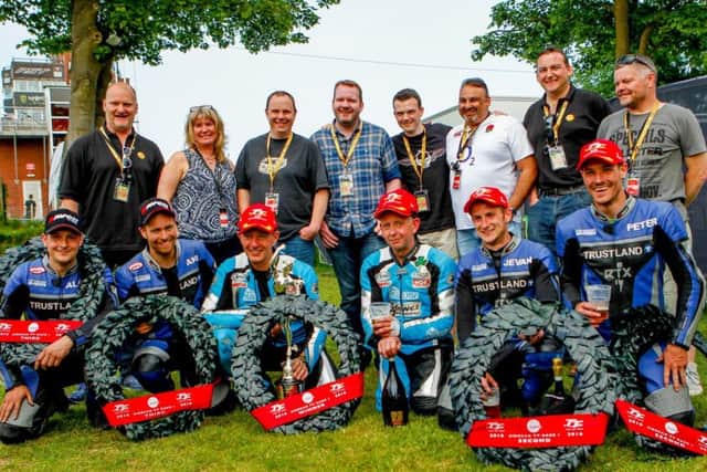 Louth sidecar passenger Jevan Walsmley (front, second from right) celebrates with the successful Founds Team EMN-160616-164420002