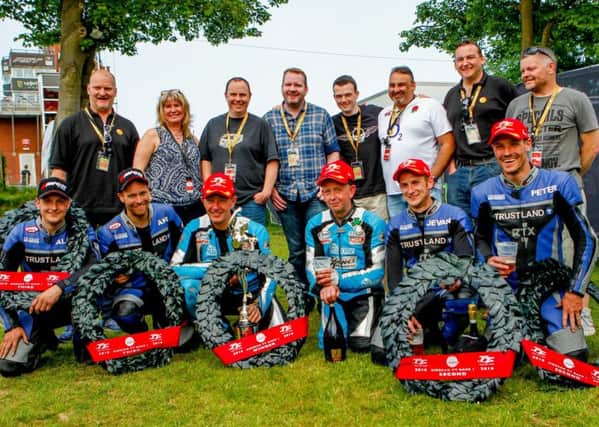 Louth sidecar passenger Jevan Walsmley (front, second from right) celebrates with the successful Founds Team EMN-160616-164420002