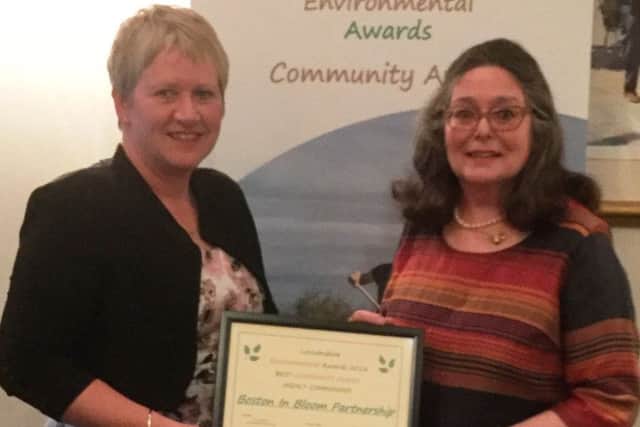 Chairman of Boston in Bloom Alison Fairman, right, and Cllr Claire Rylott, Boston Borough CouncilÃ¢Â¬"s grounds and open spaces portfolio holder, with the award.