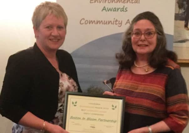 Chairman of Boston in Bloom Alison Fairman, right, and Cllr Claire Rylott, Boston Borough CouncilÃ¢Â¬"s grounds and open spaces portfolio holder, with the award.