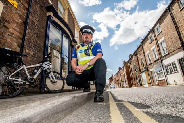PCSO Nigel Wass is warning shed owners to be alert after reports of burglaries and suspicious activity around gardens in the Coronation Walk and The Wong areas of Horncastle.  Photo by John Aron.