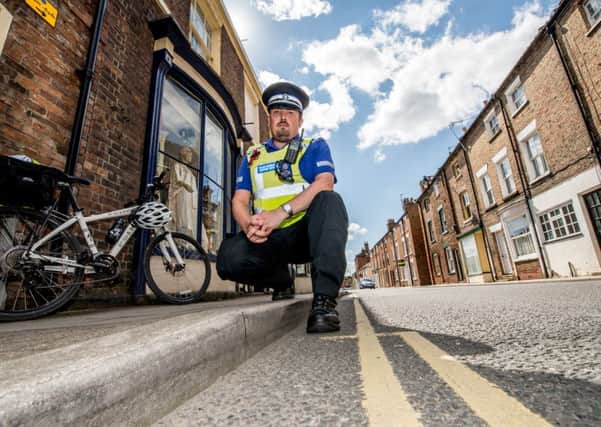 PCSO Nigel Wass is warning shed owners to be alert after reports of burglaries and suspicious activity around gardens in the Coronation Walk and The Wong areas of Horncastle.  Photo by John Aron.