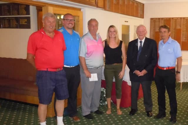 Last year's winning team with Emma Young from The Lincolnshire and Nottinghamshire Air Ambulance and Market Rasen Rotary Club Secretary Andrew Dalrymple. EMN-160620-104556002