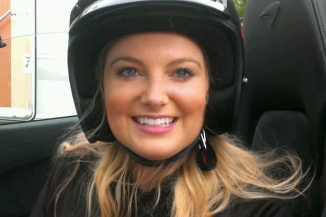 Olivia Green from Hodgkinsons Solicitors of Skegness enjoying her first race circuit experience. ANL-160620-171457001