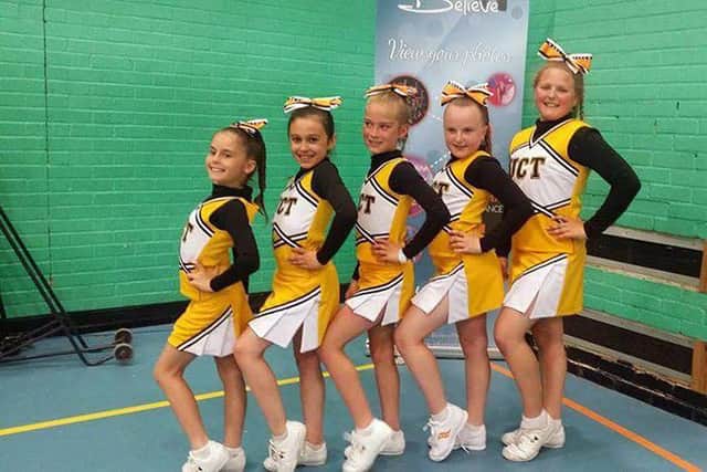 United's Cheer Team had reasons to celebrate.