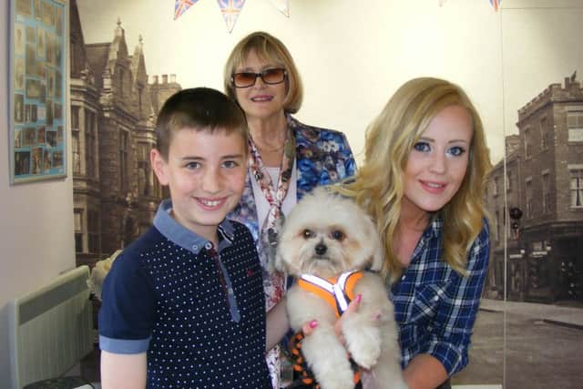 Special guests Lucy Heath and Trip Hazard present the museum quiz prize to Alfie Lewen, 10, with vice-chairman Jan Spooner. EMN-160621-125604001