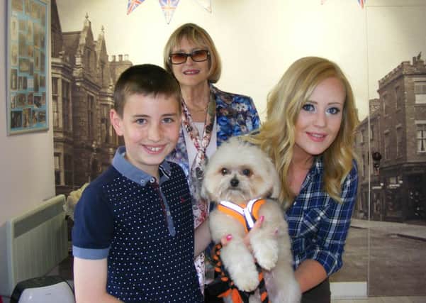 Special guests Lucy Heath and Trip Hazard present the museum quiz prize to Alfie Lewen, 10, with vice-chairman Jan Spooner. EMN-160621-125604001