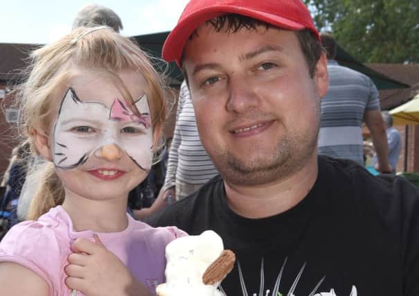 Leasingham Fete at the Village Hall. Mark Lees with Lillyann Lees 4. EMN-160629-120656001