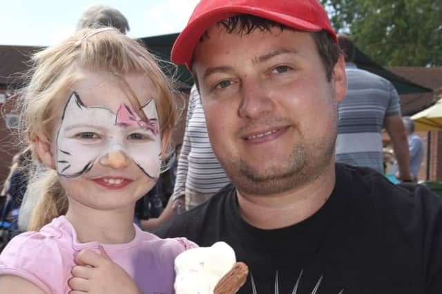 Leasingham Fete at the Village Hall. Mark Lees with Lillyann Lees 4. EMN-160629-120656001