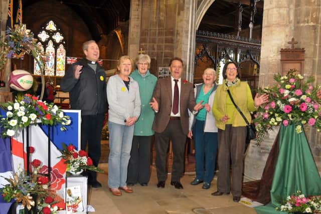 BUILDING FUND: John Hayes MP opens the annual flower festival at St Peter and St Paul's Church, Gosberton, with the 
Rev Ian Walters, Margaret Williamson, Dianne Ralph, Iris Bennett and Val Brocklehurst.  Photo by Tim Wilson.