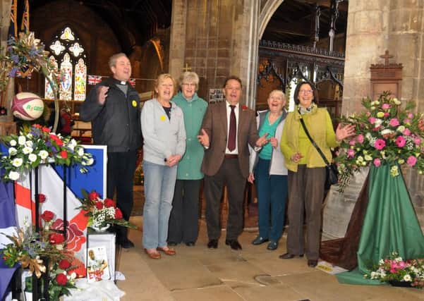BUILDING FUND: John Hayes MP opens the annual flower festival at St Peter and St Paul's Church, Gosberton, with the 
Rev Ian Walters, Margaret Williamson, Dianne Ralph, Iris Bennett and Val Brocklehurst.  Photo by Tim Wilson.