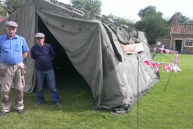 Volunteers Phil Cooling and John Culling celebrating Armed Forces Day at an exhibition at the Village Church Farm museum in Skegness. ANL-160625-182229001